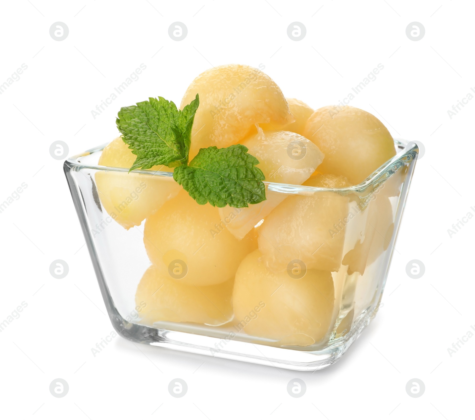 Photo of Bowl with melon balls on white background