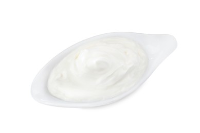 Photo of Delicious sour cream in gravy boat on white background, top view