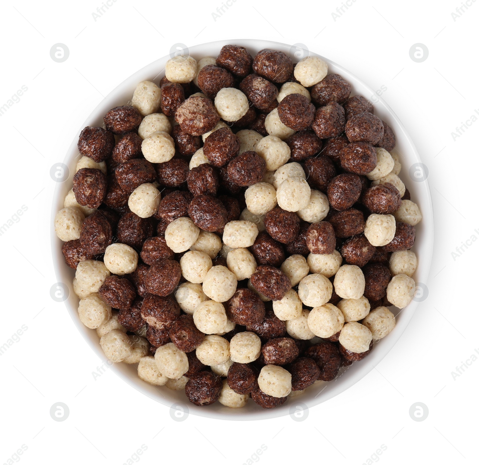 Photo of Tasty cereal balls in bowl isolated on white, top view