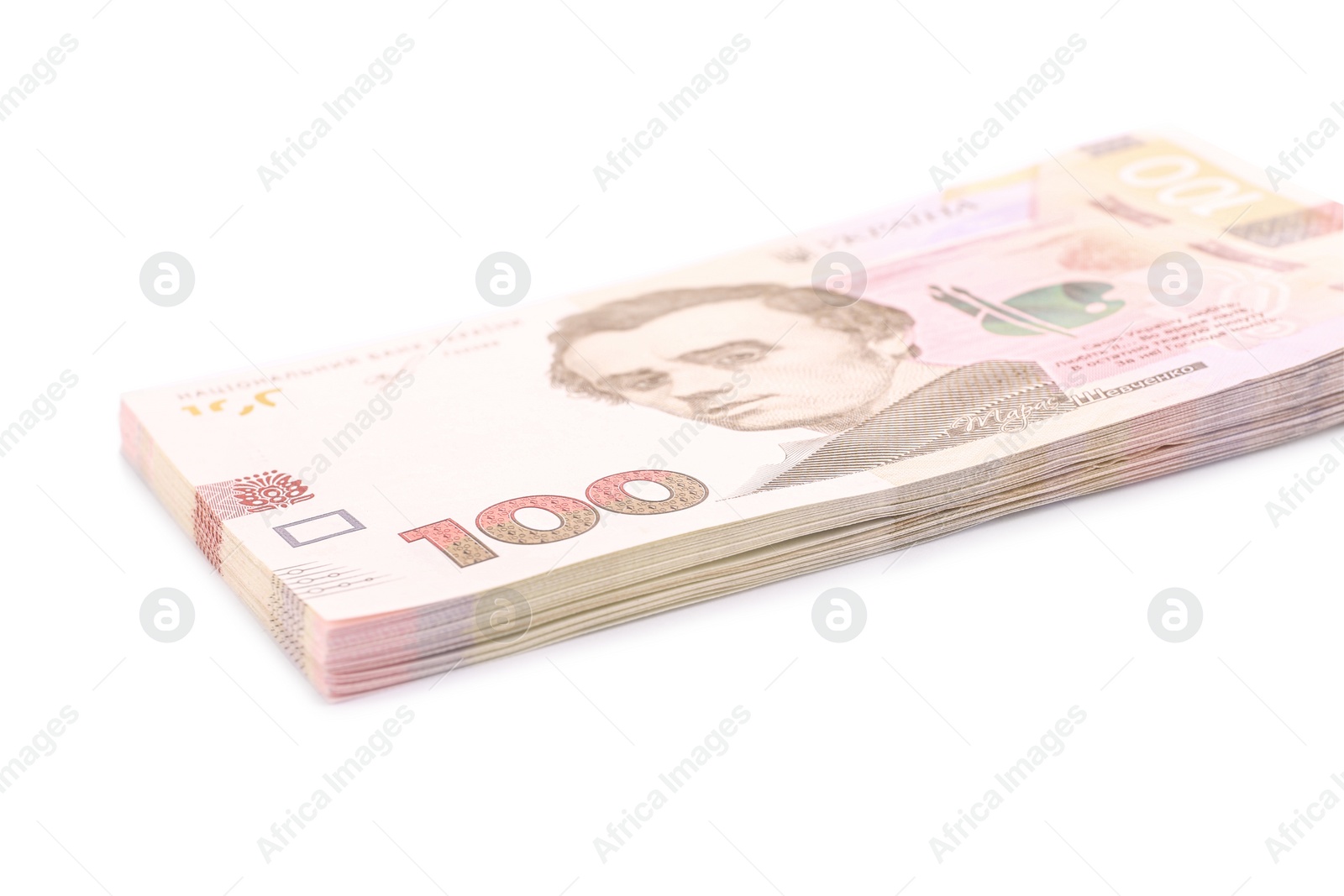 Photo of 100 Ukrainian Hryvnia banknotes on white background