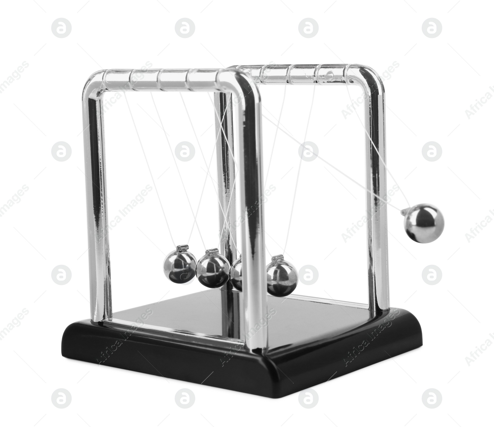 Photo of Newton's cradle isolated on white. Physics law of energy conservation