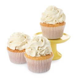 Photo of Tasty vanilla cupcakes with cream isolated on white