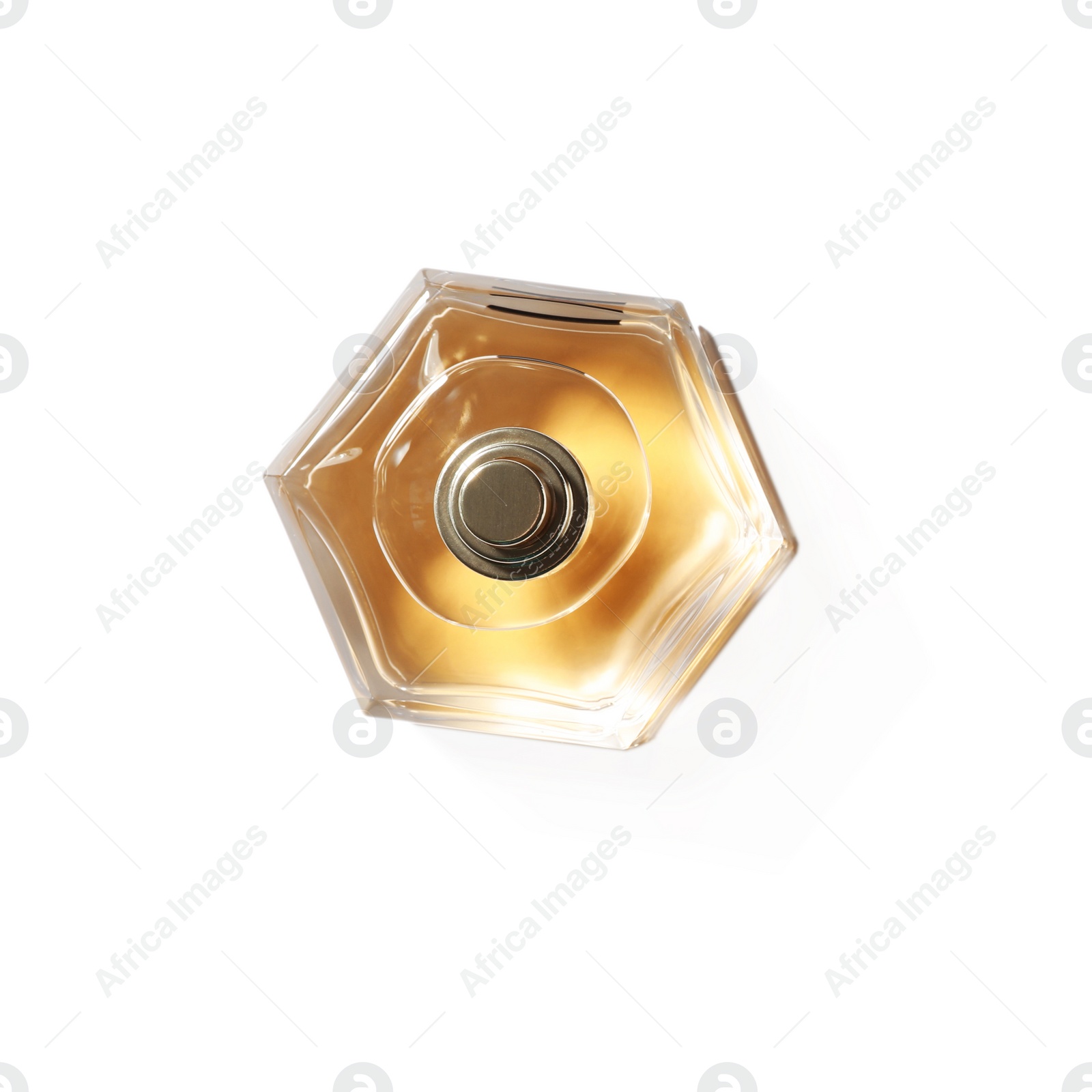 Photo of Bottle of perfume on light background, top view