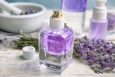 Photo of Composition with lavender flowers and natural cosmetic on table