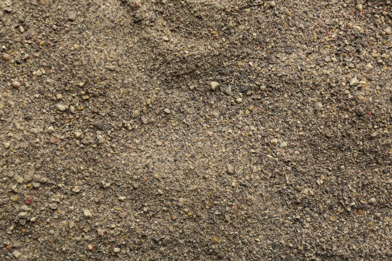 Photo of Ground black pepper as background, top view