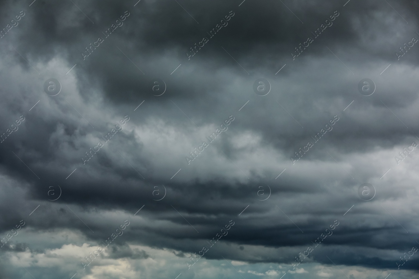 Photo of Grey thunder clouds in sky  on nasty day