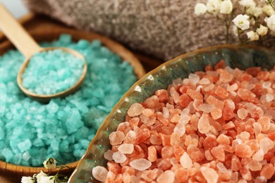 Aromatic sea salt and beautiful flowers, closeup