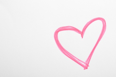 Photo of Pink heart drawn on white paper, top view