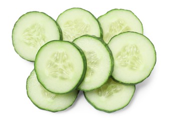 Photo of Slices of fresh cucumber isolated on white, top view