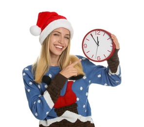 Woman in Santa hat with clock on white background. New Year countdown