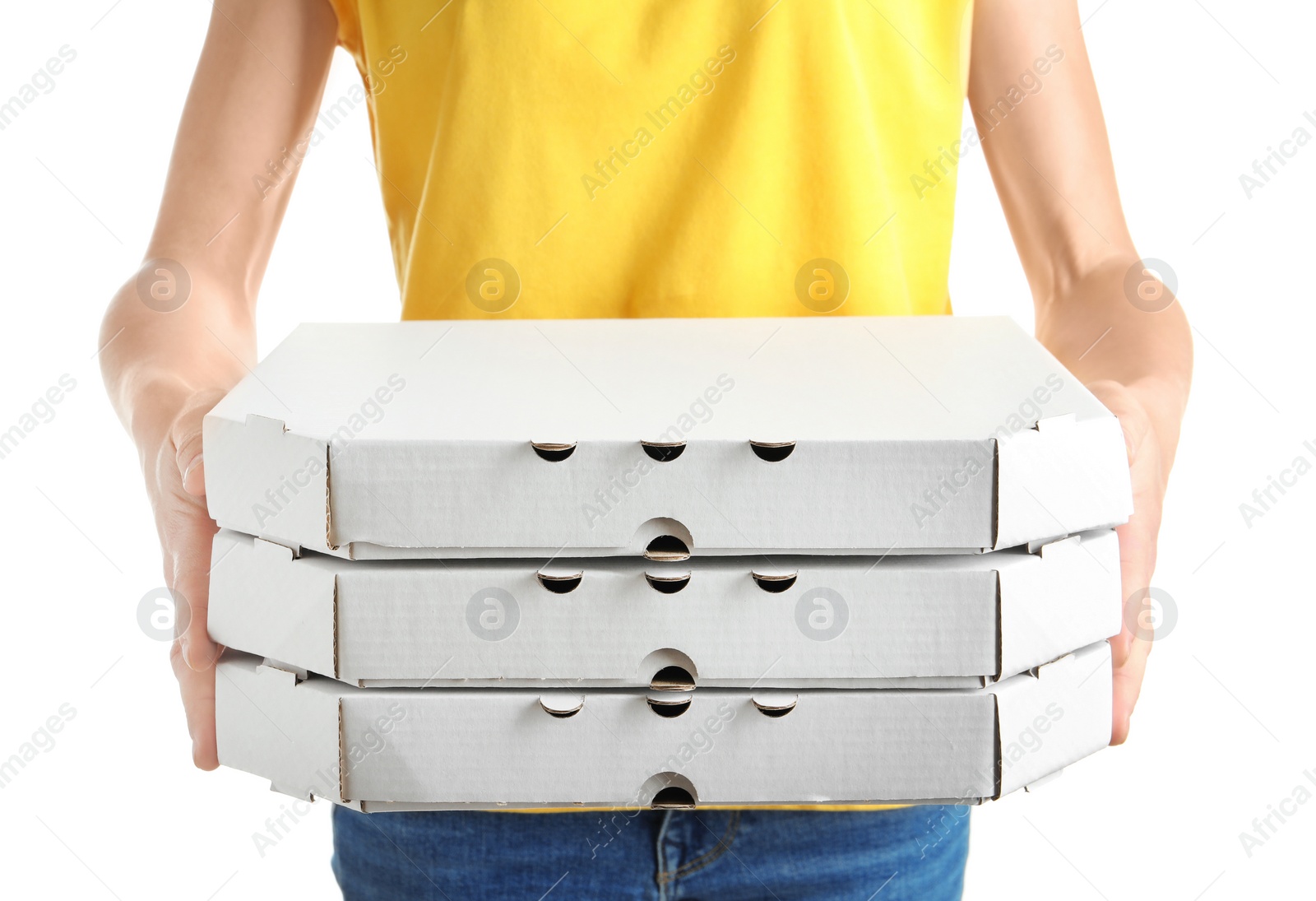 Photo of Woman holding cardboard pizza boxes on white background