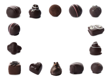 Set with different chocolate candies on white background, space for text