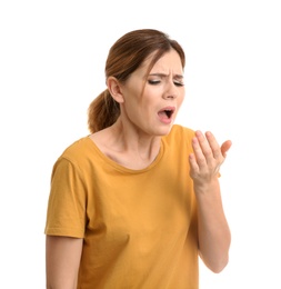 Woman suffering from cough isolated on white