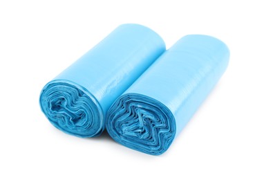 Photo of Two rolls of light blue garbage bags isolated on white