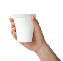 Photo of Woman holding styrofoam cup on white background, closeup