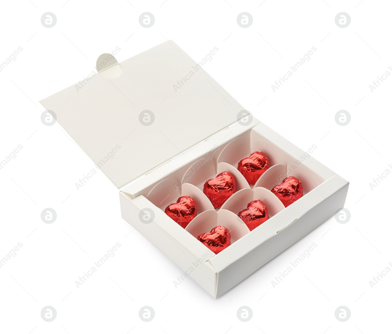 Photo of Heart shaped chocolate candies in box on white background