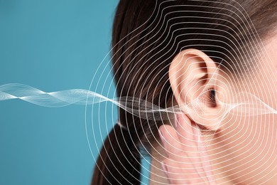 Hearing loss concept. Woman and sound waves illustration on light blue background, closeup