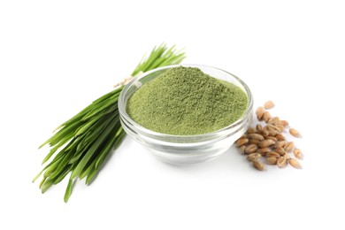 Wheat grass powder in glass bowl, seeds and fresh sprouts isolated on white