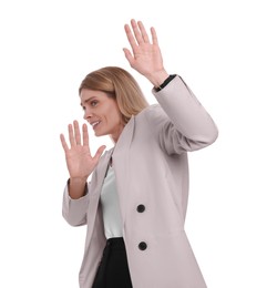 Photo of Scared businesswoman avoiding something on white background