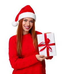 Photo of Young woman in red sweater and Santa hat with Christmas gift on white background