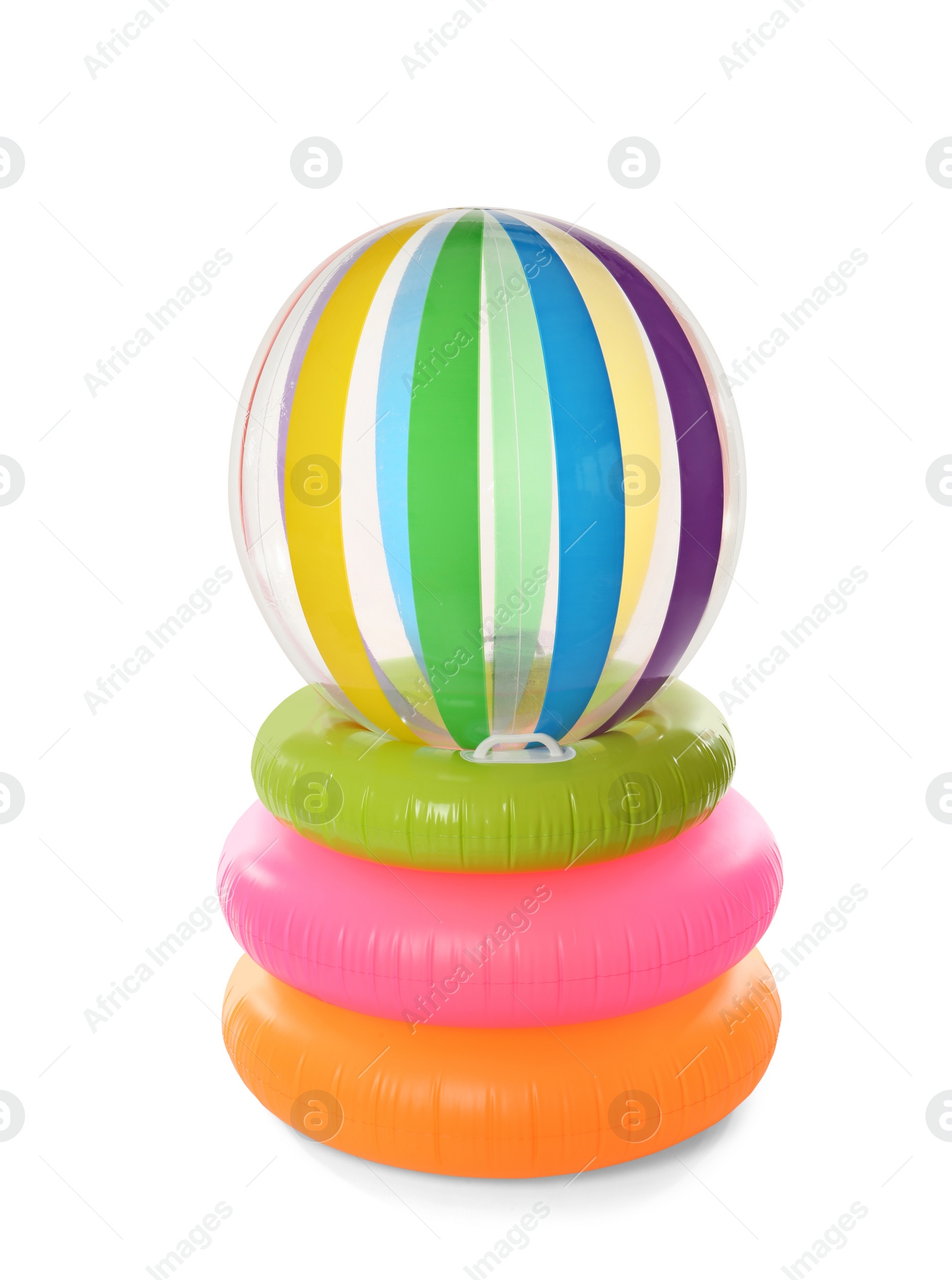 Photo of Inflatable rings and beach ball on white background. Summer holidays