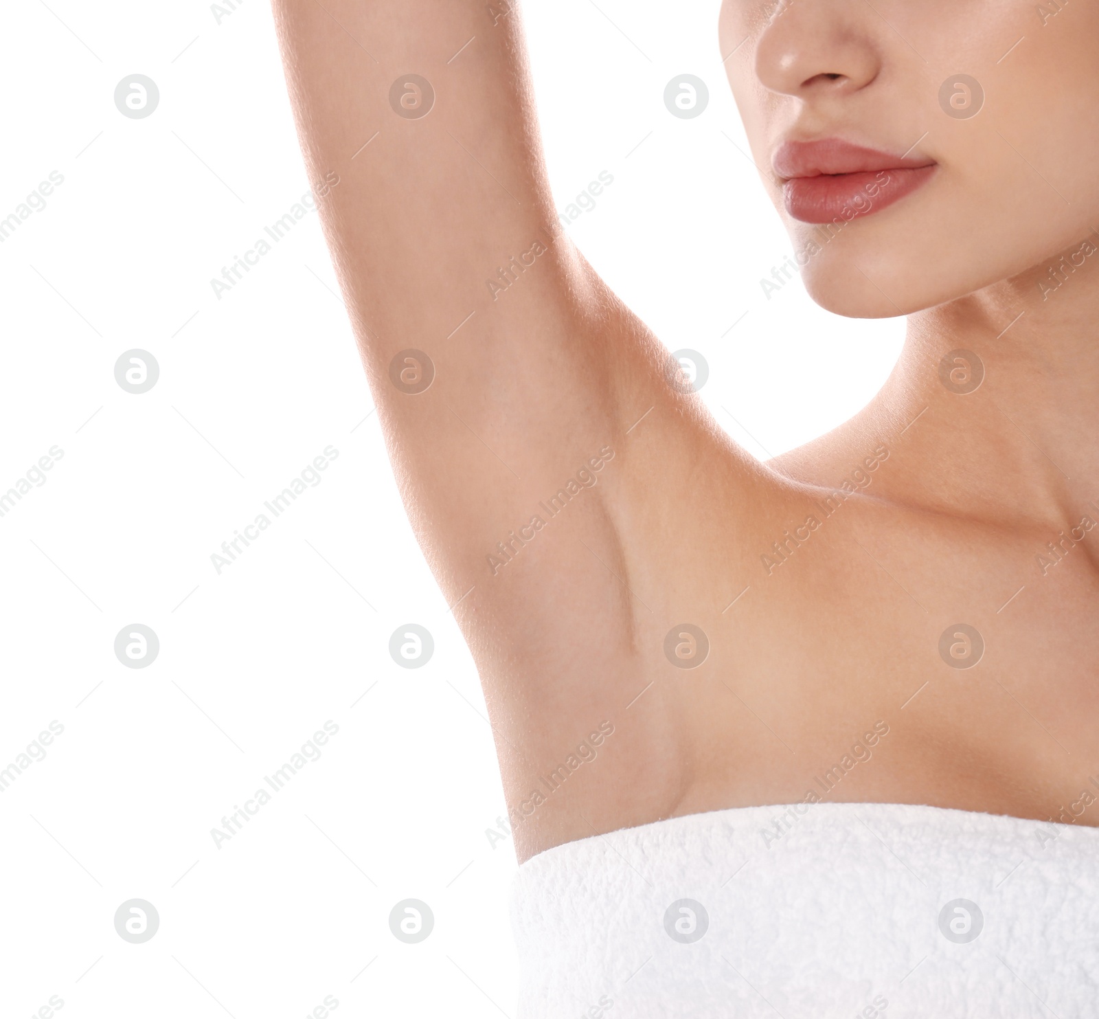 Photo of Young woman showing armpit on white background, closeup. Epilation procedure