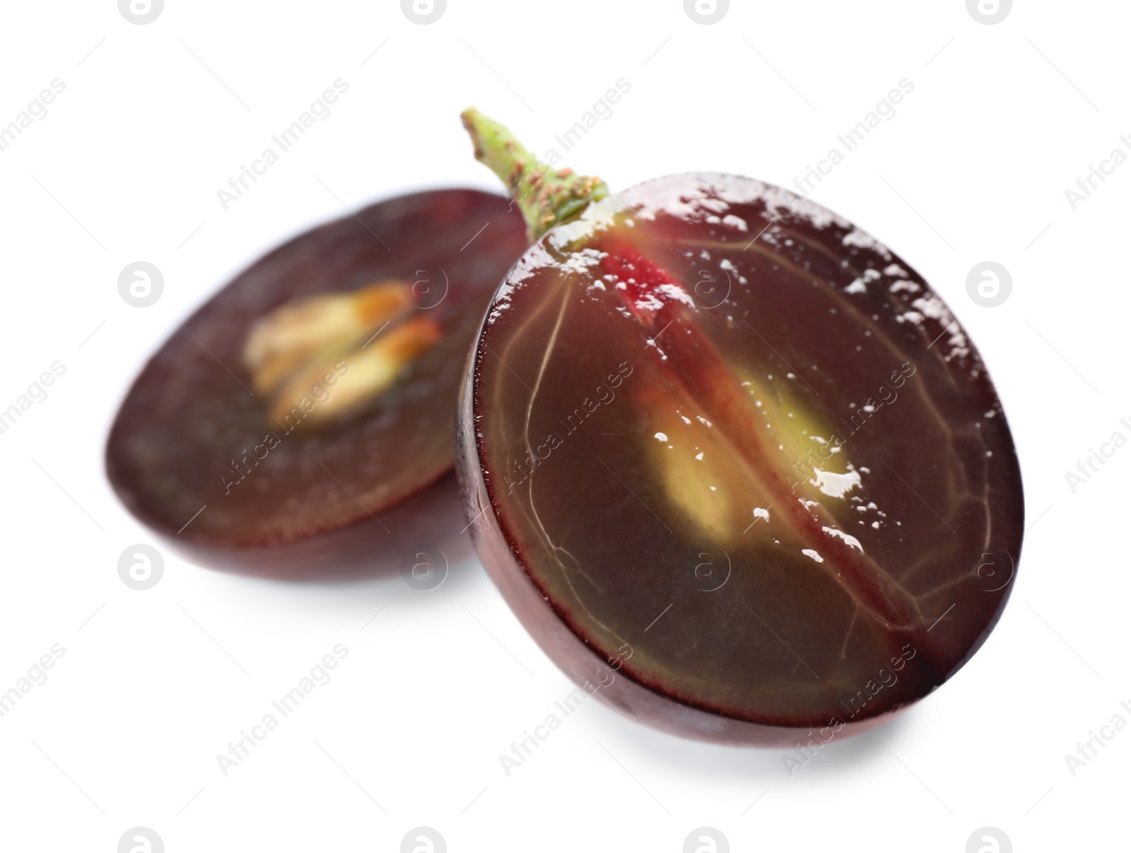 Photo of Fresh ripe cut juicy grapes on white background