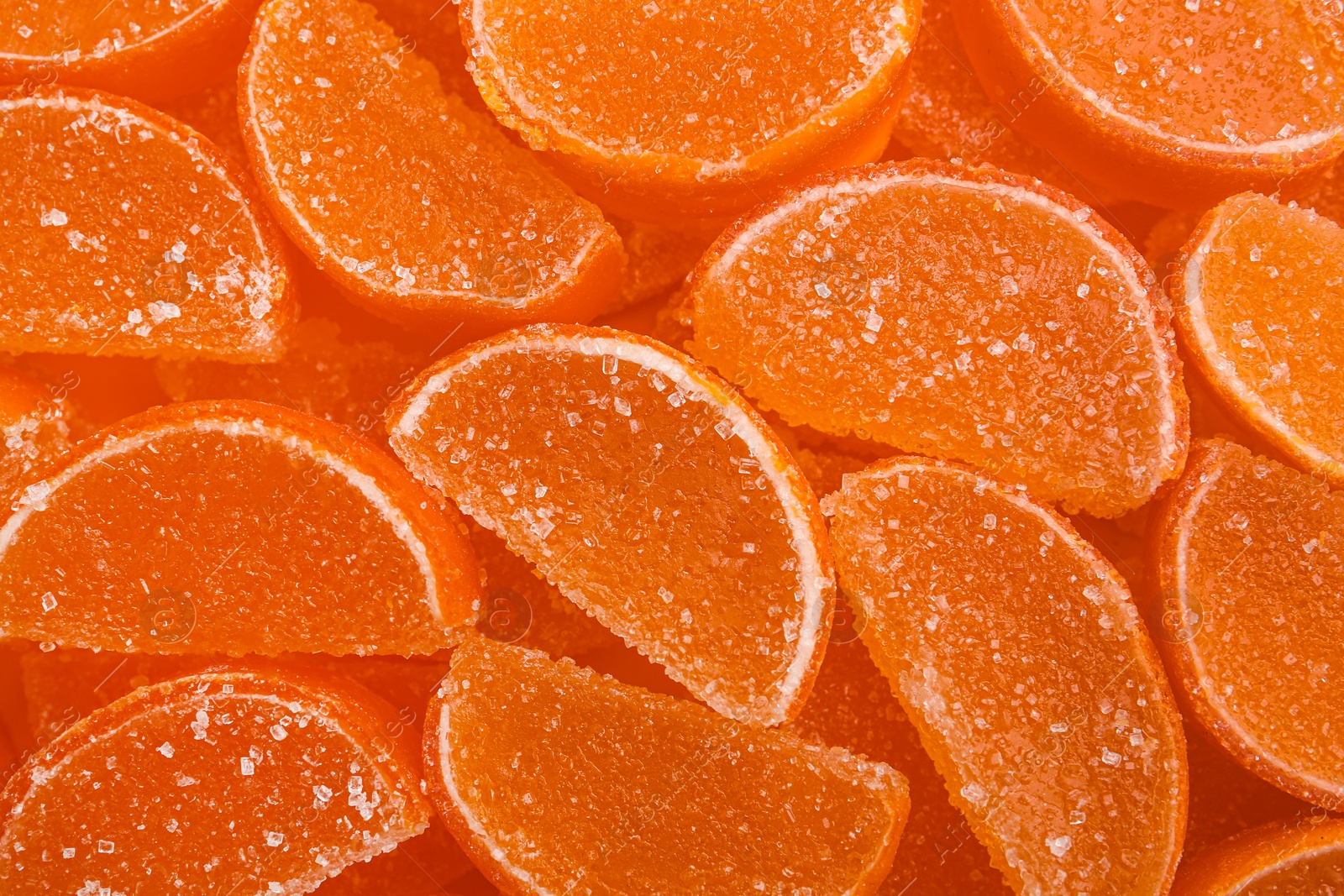 Photo of Sweet orange marmalade as background, top view