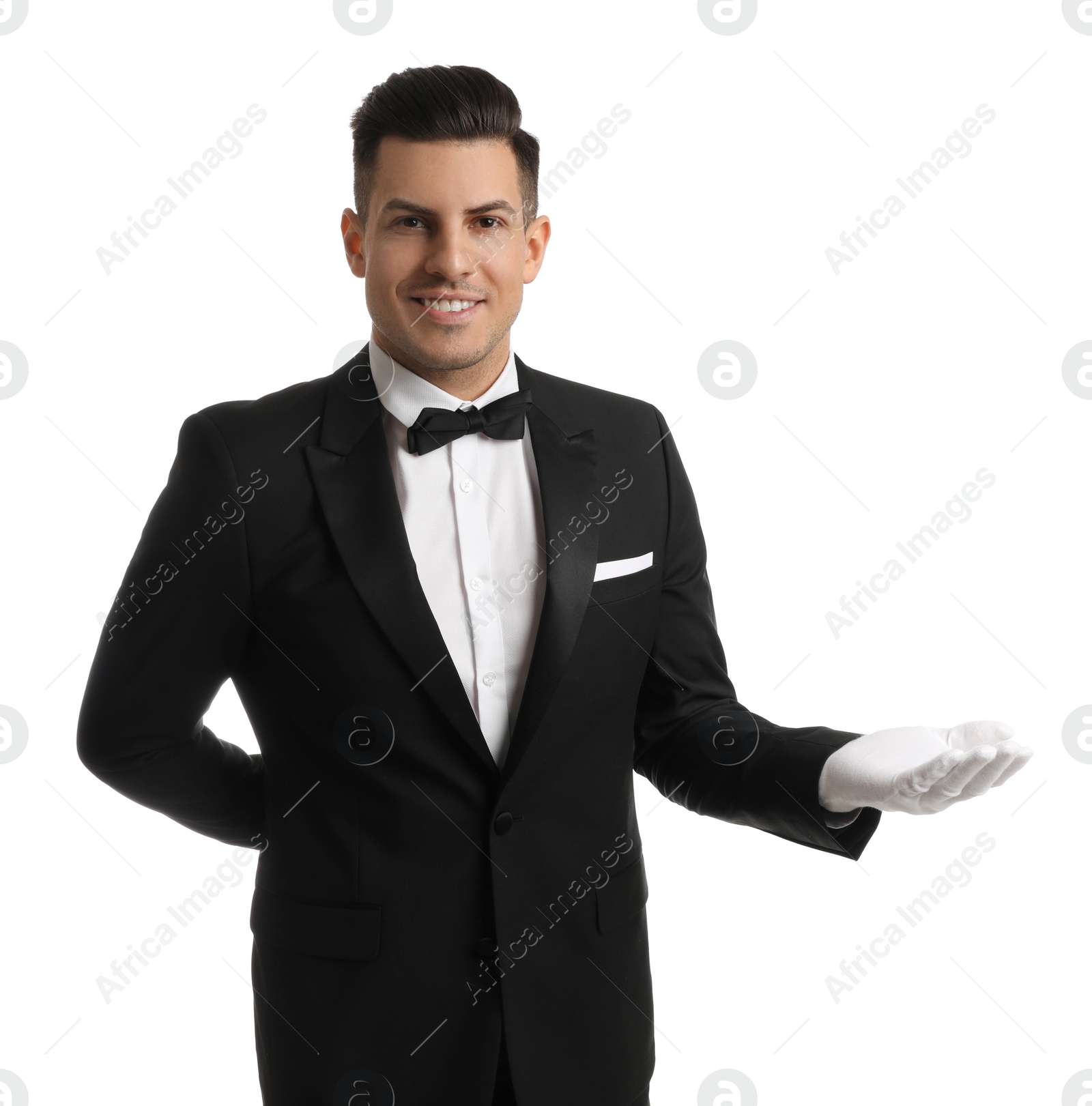 Photo of Handsome butler in elegant uniform on white background