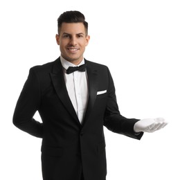 Photo of Handsome butler in elegant uniform on white background