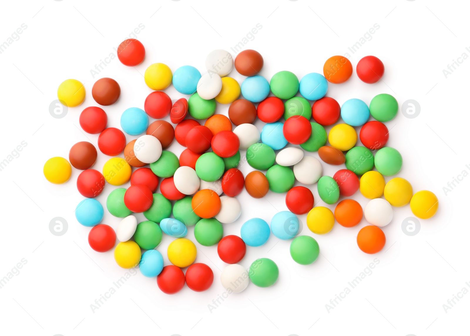 Photo of Many small colorful candies on white background, top view