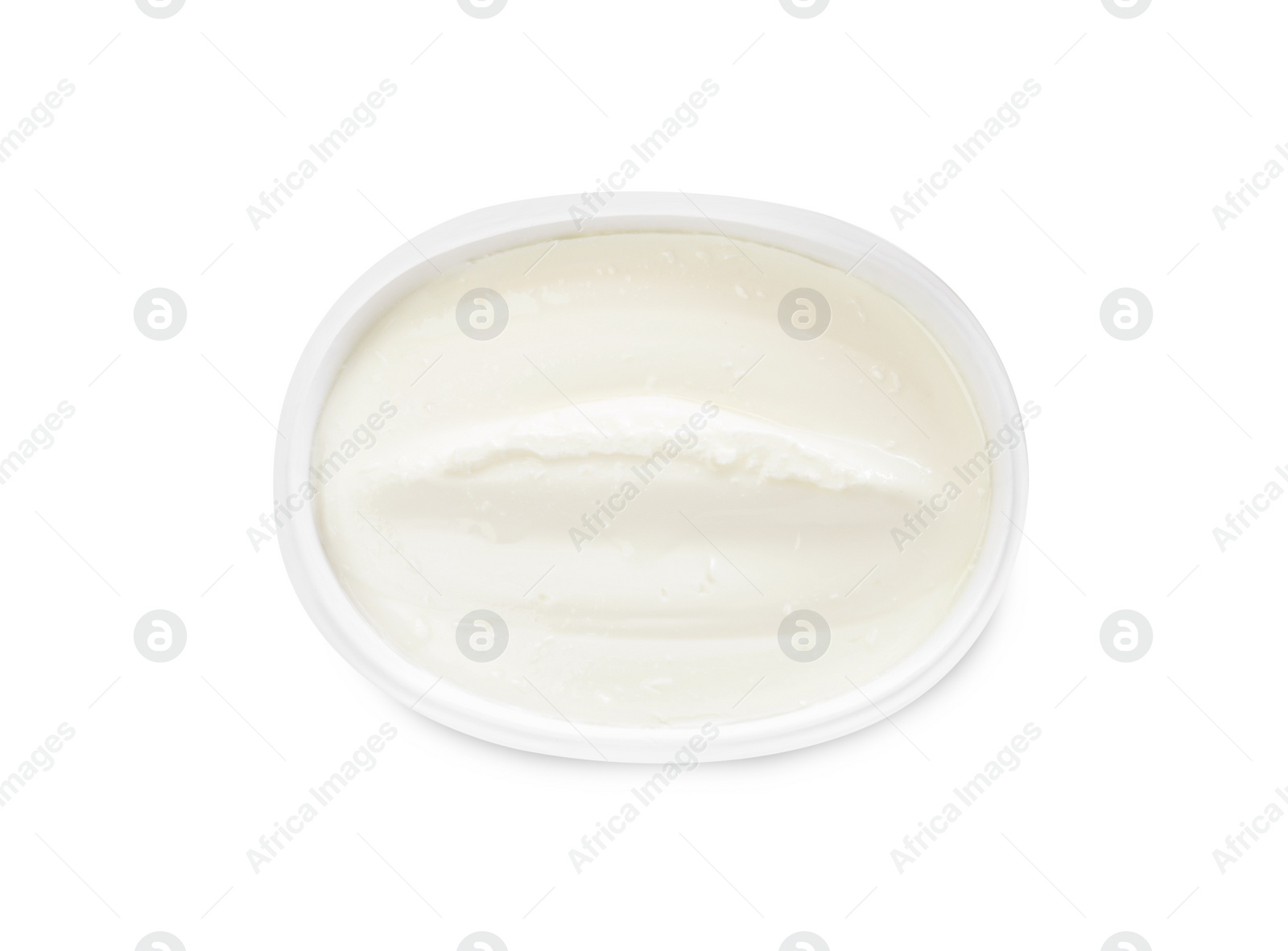 Photo of Plastic container of tasty cream cheese isolated on white, top view