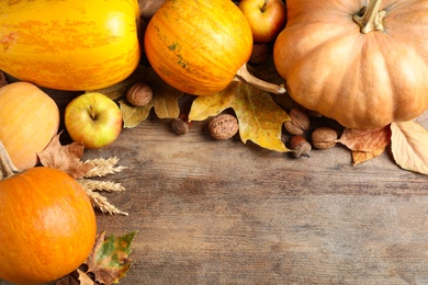 Autumn vegetables on wooden background, flat lay with space for text. Happy Thanksgiving day