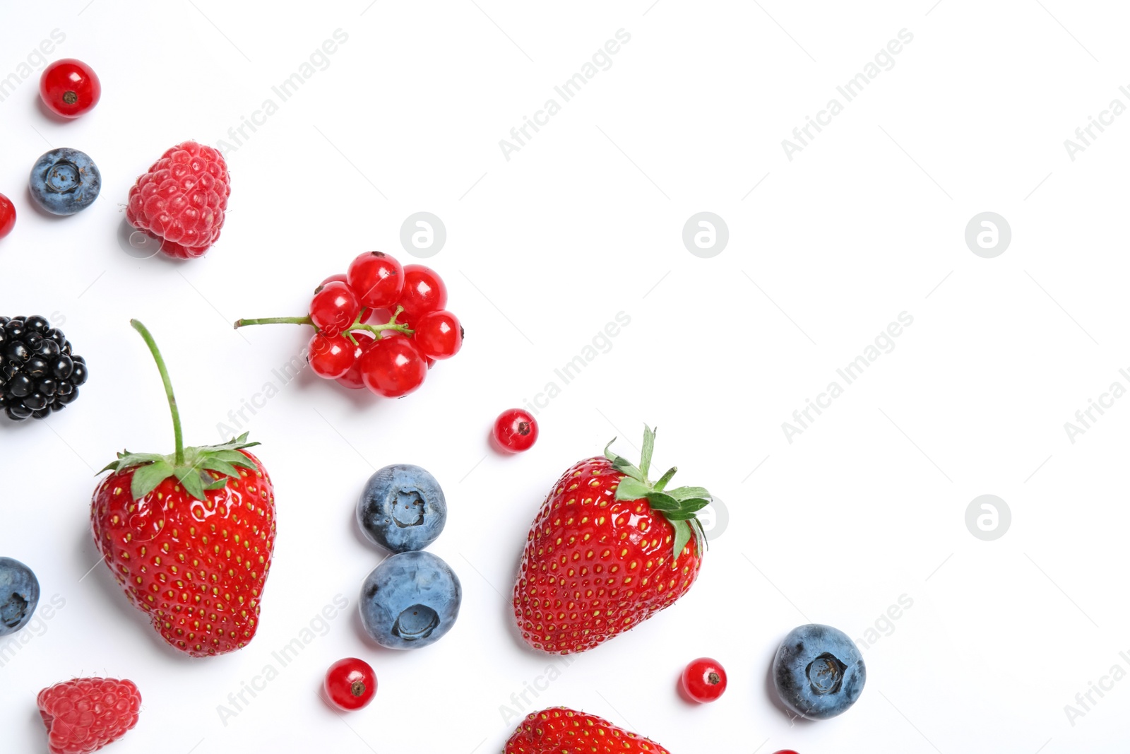 Photo of Mix of fresh berries on white background, flat lay