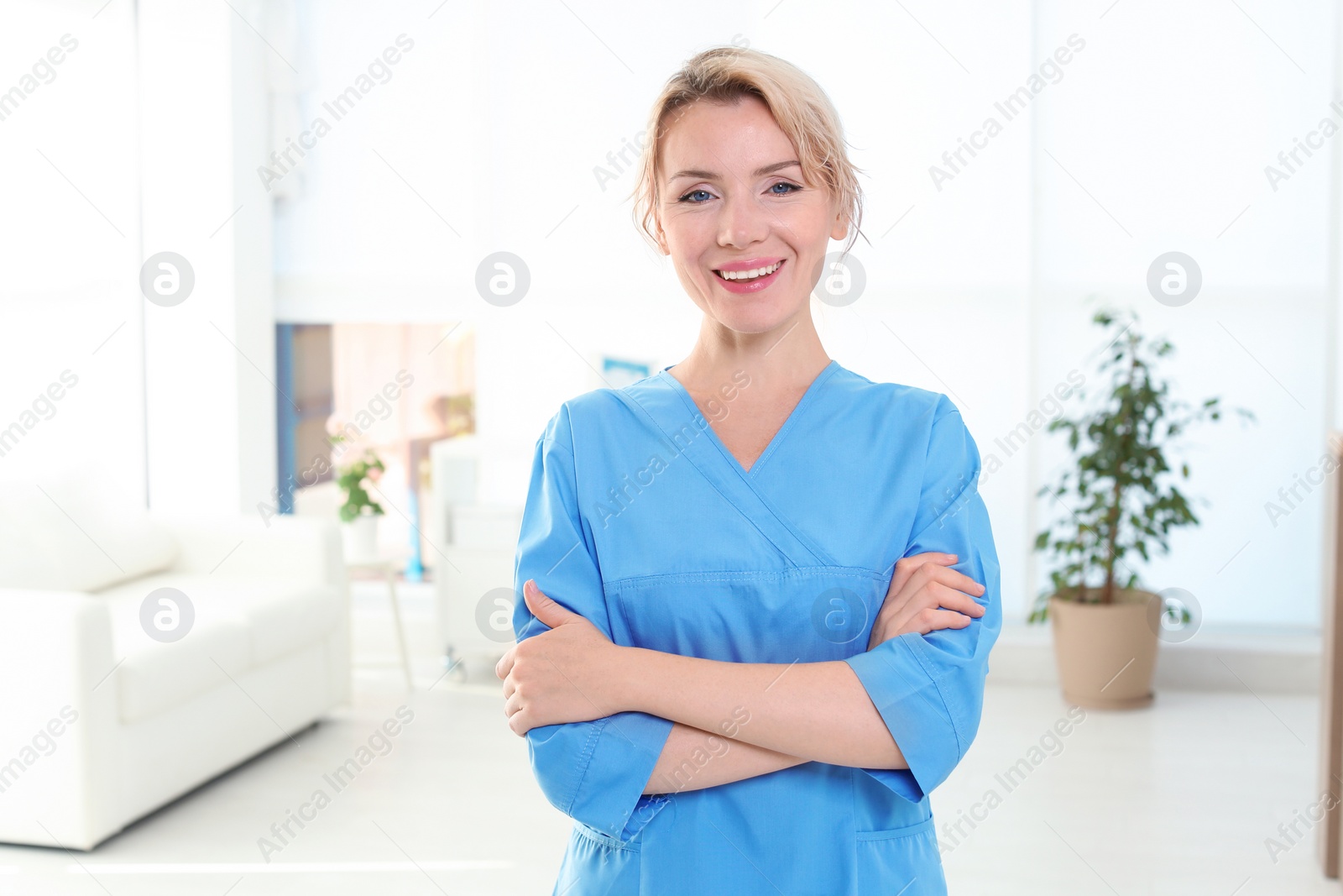 Photo of Female medical assistant in clinic. Health care service