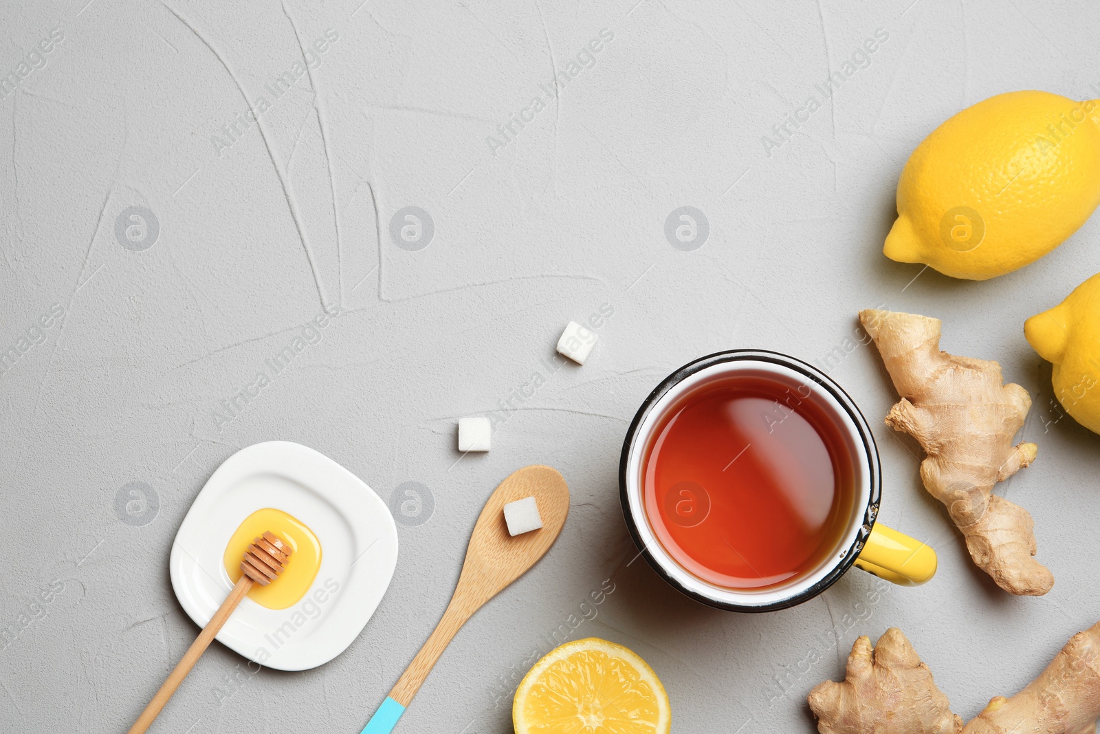 Photo of Composition with lemon tea on table. Space for text