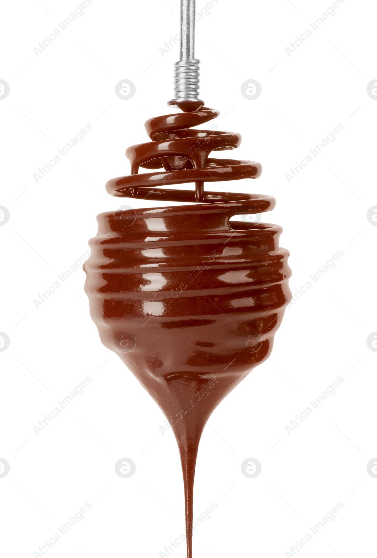 Photo of Chocolate cream flowing from whisk on white background