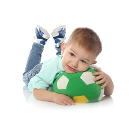 Photo of Cute little child with soft soccer ball on white background. Playing indoors