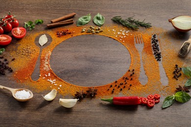 Silhouettes of cutlery and plate made with spices and ingredients on wooden table