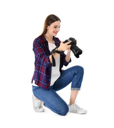 Photo of Professional photographer with modern camera on white background