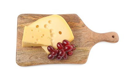 Photo of Pieces of delicious cheese and grapes isolated on white, top view