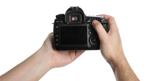 Photo of Photographer holding modern camera on white background, closeup