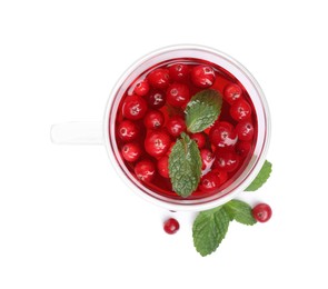 Tasty hot cranberry tea with mint in glass cup on white background, top view