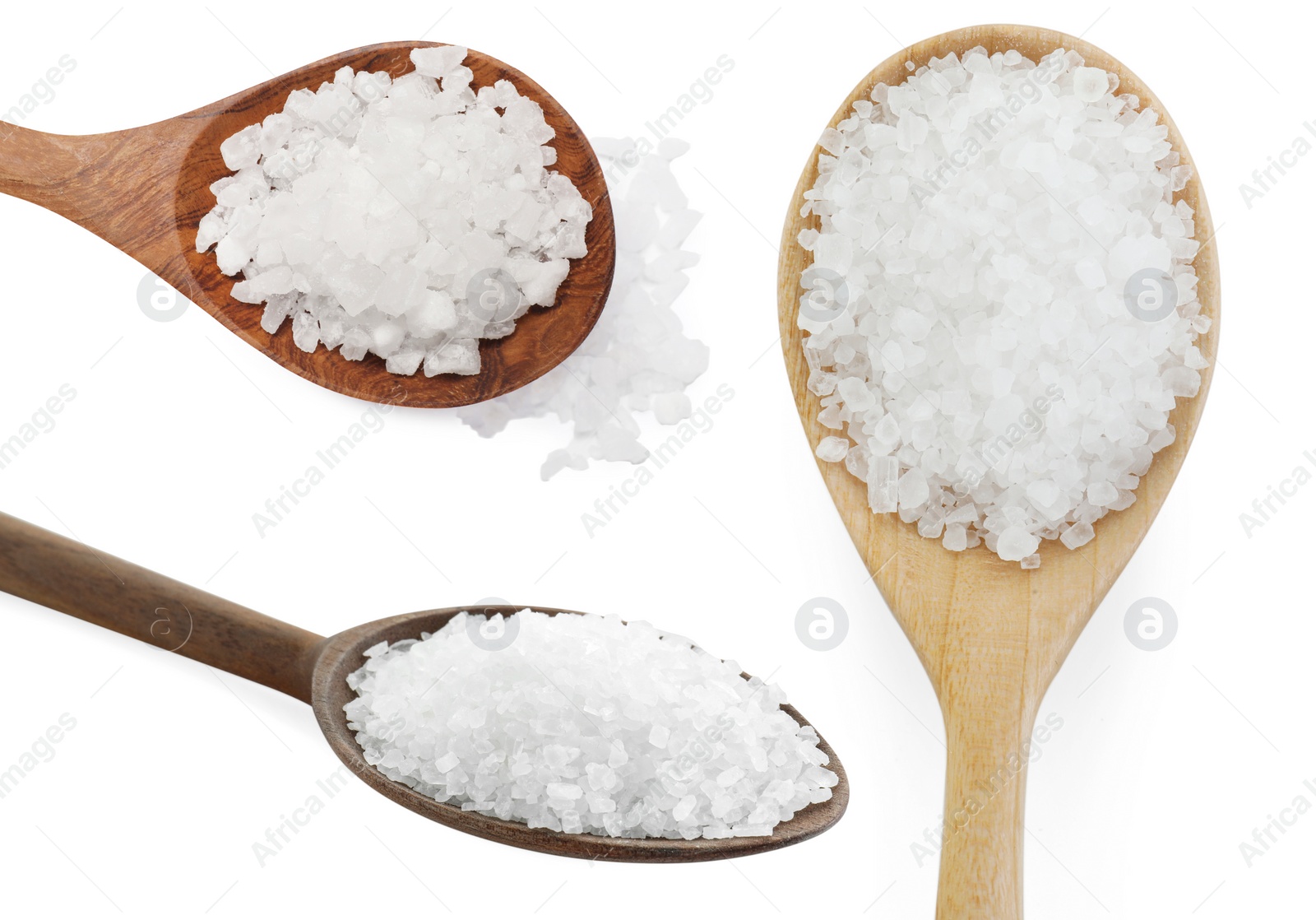 Image of Natural salt in wooden spoons isolated on white, set