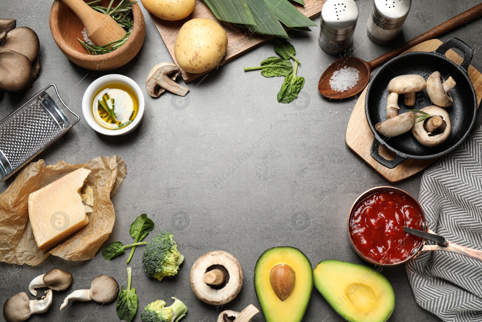 Photo of Flat lay composition with fresh products on grey table, space for text. Healthy cooking