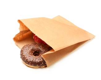 Photo of Paper bag with donuts on white background. Space for design