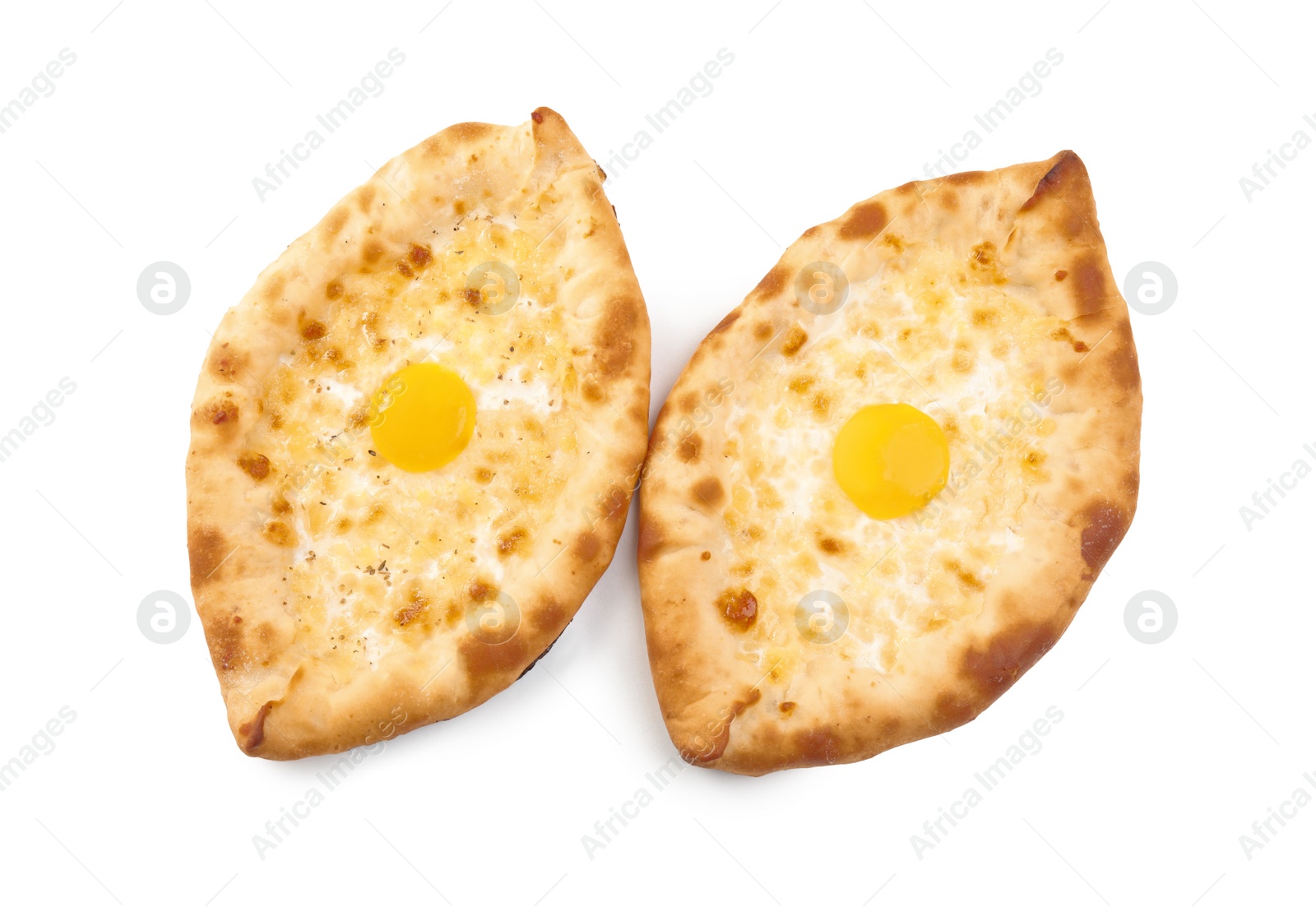 Photo of Fresh delicious Adjarian khachapuris on white background, top view