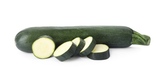 Photo of Cut and whole green ripe zucchini isolated on white