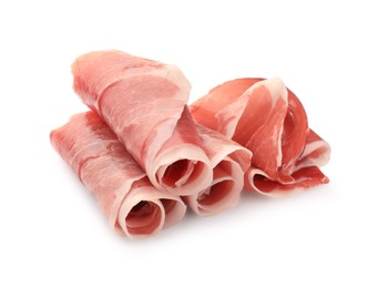 Photo of Rolled slices of delicious jamon isolated on white