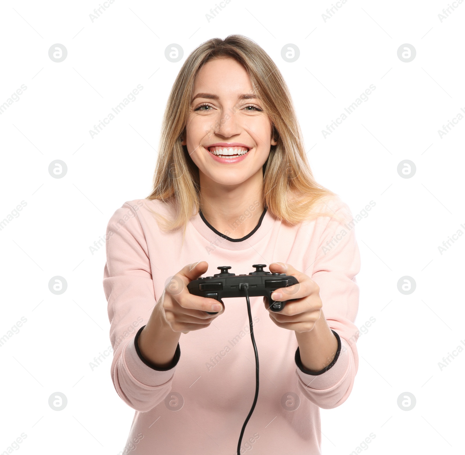 Photo of Emotional young woman playing video games with controller isolated on white